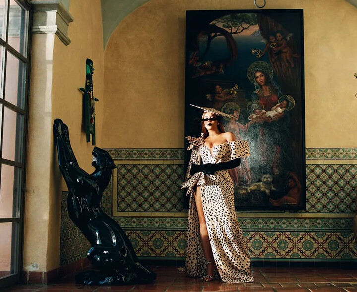 Beyon in outstanding dress standing in front of Irina Shchukina's painting Sagrada Familia