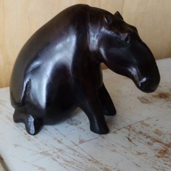 Sculpture titled "Sitting Ebony hippo" by Obed Omwange, Original Artwork, Wood