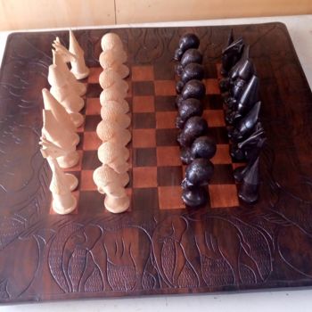 Sculpture titled "Ebony chess set" by Obed Omwange, Original Artwork, Wood