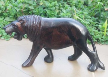 Sculpture titled "Ebony lion small" by Obed Omwange, Original Artwork, Wood