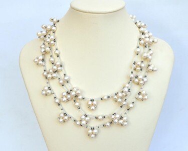 Design intitulée "Three strand pearl…" par Irena Zelickman, Œuvre d'art originale, Bijoux