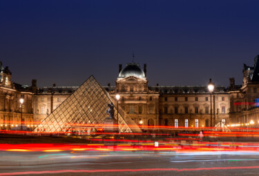 Two archaeologists, including a Louvre curator, are detained by French authorities as part of an ongoing international art-trafficking dragnet