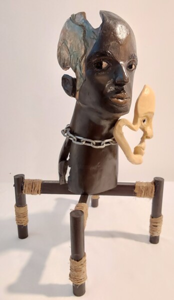 Escultura titulada "Pourtant l’Afrique…" por Lucien-Carol Proulx, Obra de arte original, Madera