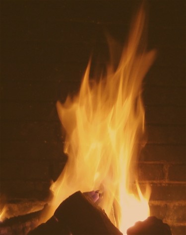 Fotografia intitolato "Feu de cheminée" da Maclade, Opera d'arte originale, Altro