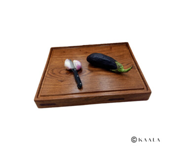 Diseño titulada "Planche à découper" por Soumaila Kanla, Obra de arte original, Arte de mesa