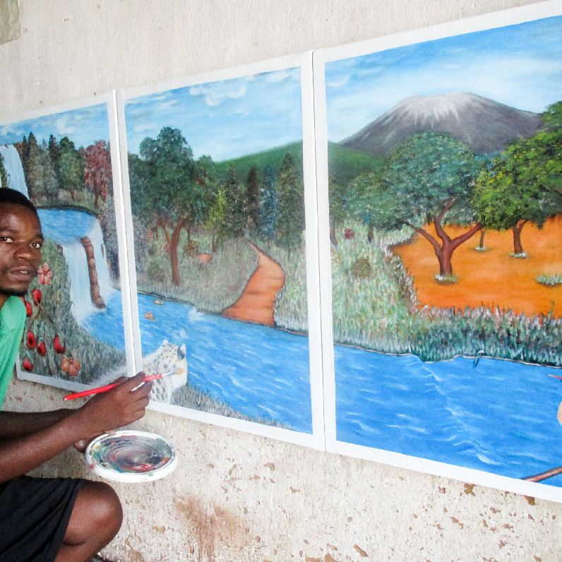 Akida Amos (AKAM) - The artist at work