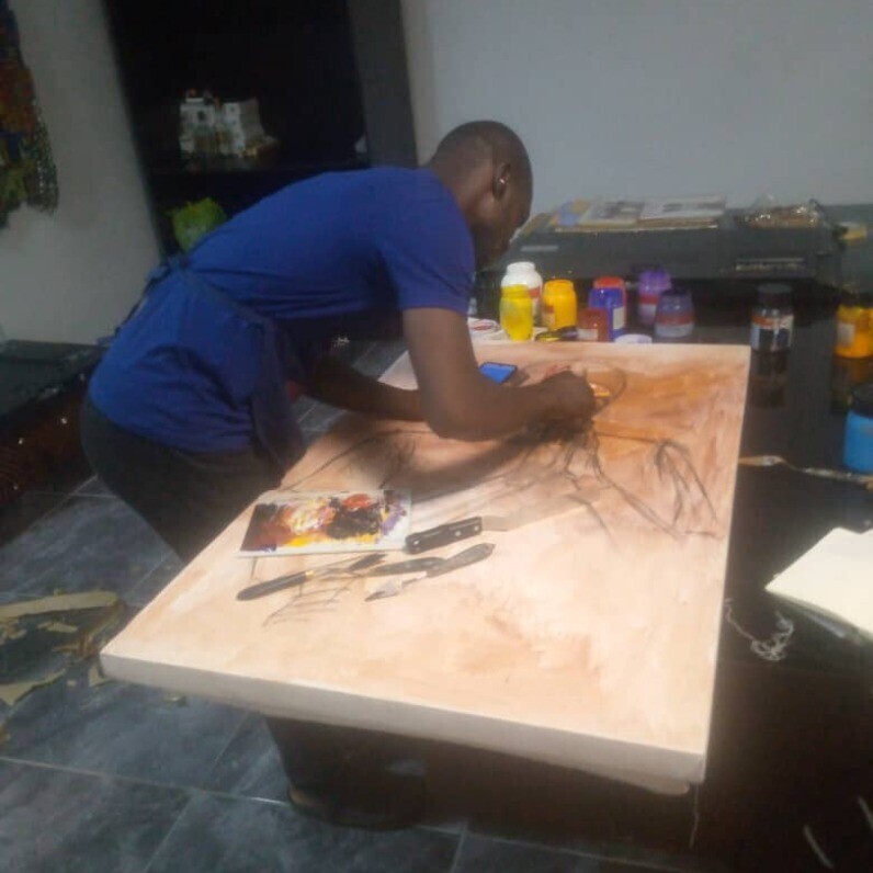 Moses Baite - The artist at work
