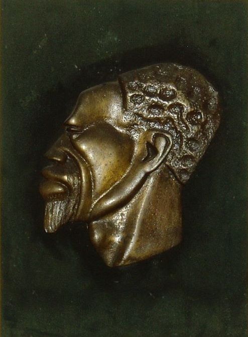 Sculpture intitulée "Cabeza de Bronce" par Andrè Degel, Œuvre d'art originale, Métaux Monté sur Panneau de bois