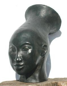 Sculpture titled "Tête noire allongée" by Claude Boutin, Original Artwork