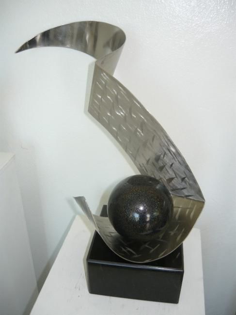 Sculpture titled "ECLIPSE" by Luis Matos Sanchez, Original Artwork, Metals