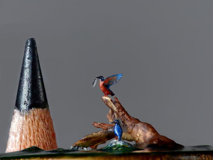Marie Cohydon carves incredible little bird sculptures that require a microscope to be appreciated