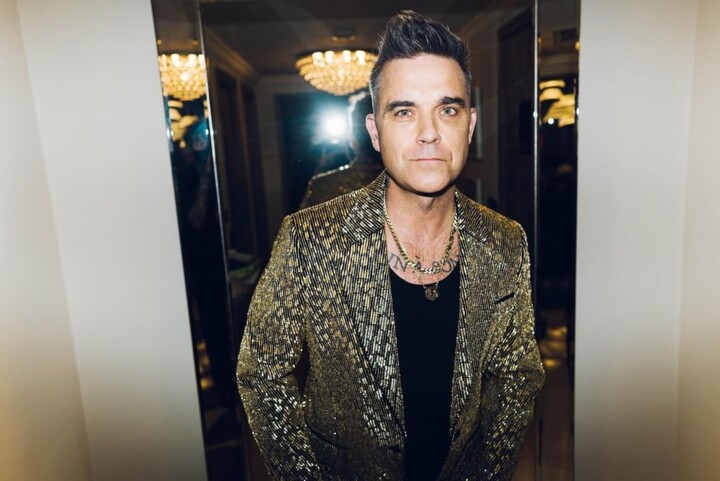 Robbie Williams leiloa sua obra de arte de Banksy
