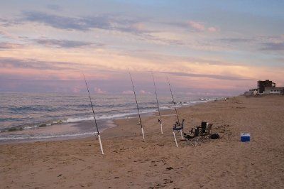 Photography titled "Fishing Rods Sunset…" by Susan Ledford, Original Artwork