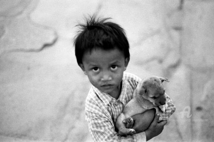 Photography titled "Child holding a dog…" by Scott Gregory Banner, Original Artwork, Analog photography