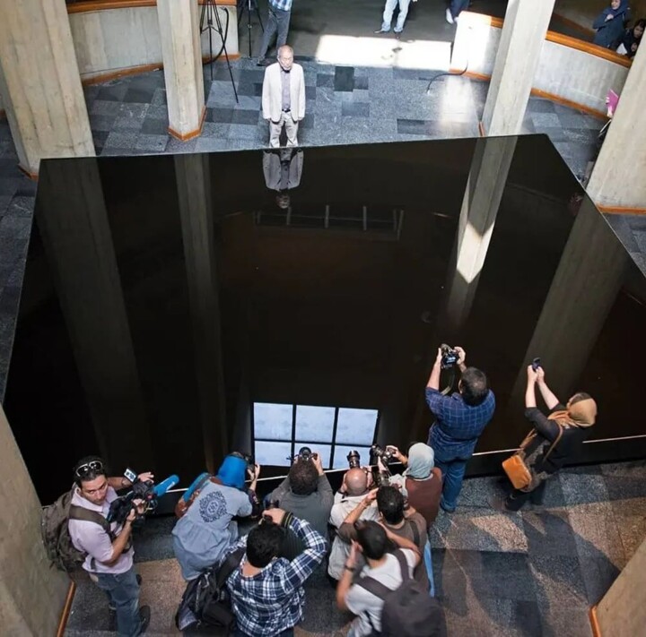 The director of the Tehran Museum was fired after an artist fell into an oil pool during a performance