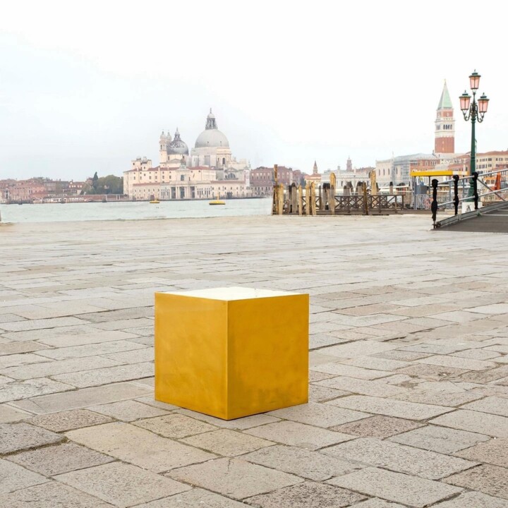 After first appearing in New York, a €10 million 24-karat gold cube sculpture appears in Venice