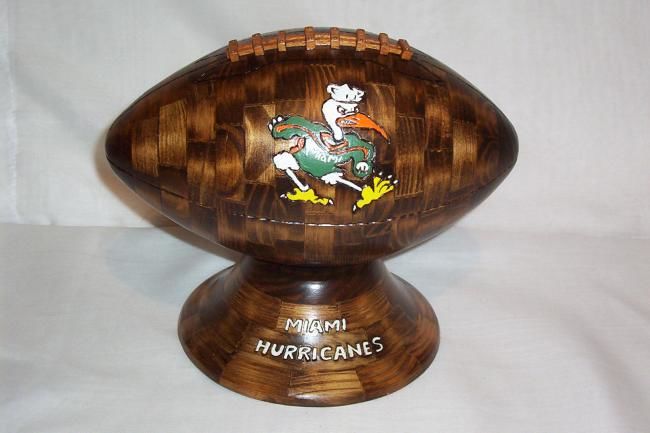 Sculpture titled "Wood Football" by Lane Daniel, Original Artwork, Wood