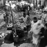 Fotografia intitulada "A Vendor in a busy…" por Aladin Abdel Naby, Obras de arte originais, Fotografia digital